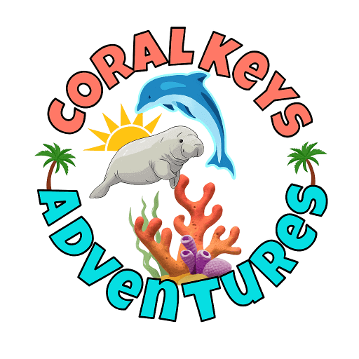 A colorful logo featuring the text "CORAL KEYS Adventures" arranged in a circular pattern. Inside the circle, there is a sun partially visible behind a manatee and a dolphin jumping above vibrant coral reefs. Two small palm trees flank the coral on either side. The text "CORAL KEYS" is in coral pink, while "Adventures" is in bright turquoise.